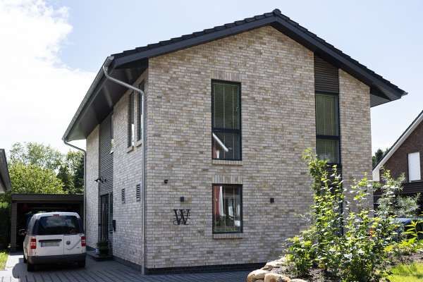Einfamilienhaus H1 mit Klinker 122-127-NF grau gelb bunt